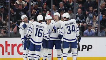 Mar 10, 2025; Salt Lake City, Utah, USA; Toronto Maple Leafs right wing William Nylander (middle) celebrates a goal on a power play against the Utah Hockey Club during the first period at Delta Center. Mandatory Credit: Rob Gray-Imagn Images