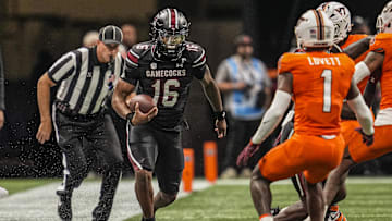 Aug 31, 2025; Atlanta, Georgia, USA; South Carolina Gamecocks quarterback LaNorris Sellers (16) runs on the sideline against the Virginia Tech Hokies during the first quarter at Mercedes-Benz Stadium. Mandatory Credit: Dale Zanine-Imagn Images