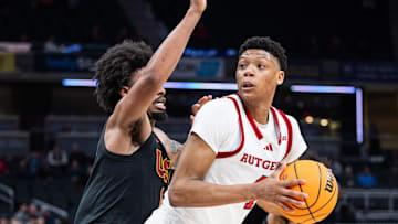 Mar 12, 2025; Indianapolis, IN, USA;  Rutgers Scarlet Knights guard Ace Bailey (4) shoots the ball while USC Trojans guard Kevin Patton Jr. (8) defends in the second half at Gainbridge Fieldhouse. Mandatory Credit: Trevor Ruszkowski-Imagn Images