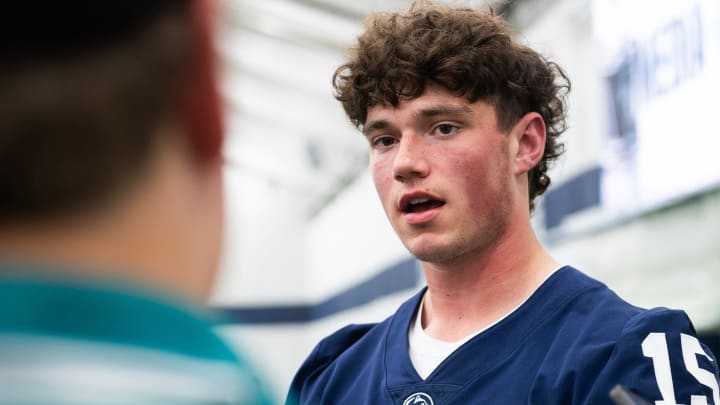 Penn State quarterback Drew Allar talks with reporters during football media day in Holuba Hall.