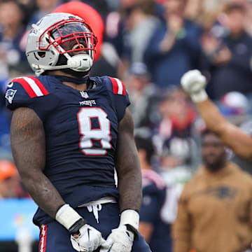 Nov 5, 2023; Foxborough, Massachusetts, USA; New England Patriots linebacker Ja'Whaun Bentley (8) celebrates after sacking Washington Commanders quarterback Sam Howell (14) during the second half at Gillette Stadium. Mandatory Credit: Paul Rutherford-Imagn Images