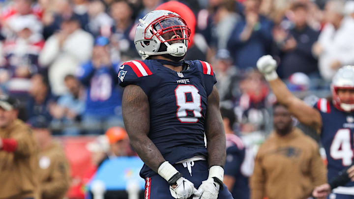 Nov 5, 2023; Foxborough, Massachusetts, USA; New England Patriots linebacker Ja'Whaun Bentley (8) celebrates after sacking Washington Commanders quarterback Sam Howell (14) during the second half at Gillette Stadium. Mandatory Credit: Paul Rutherford-Imagn Images