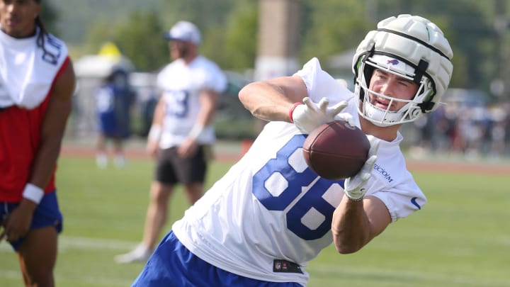 Bills tight end Dalton Kincaid eyes in a pass during the opening day of Buffalo Bills training camp.