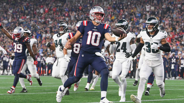 Aug 15, 2024; Foxborough, MA, USA; New England Patriots quarterback Drake Maye (10) runs the ball in for a touchdown against the Philadelphia Eagles during the first half at Gillette Stadium. Mandatory Credit: Eric Canha-USA TODAY Sports