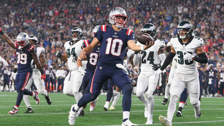 Aug 15, 2024; Foxborough, MA, USA; New England Patriots quarterback Drake Maye (10) runs the ball in for a touchdown against the Philadelphia Eagles during the first half at Gillette Stadium. Mandatory Credit: Eric Canha-USA TODAY Sports