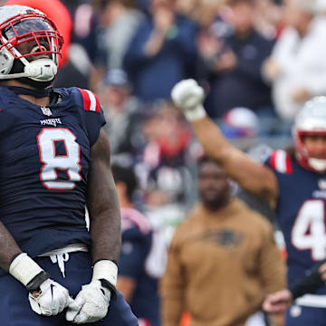 Nov 5, 2023; Foxborough, Massachusetts, USA; New England Patriots linebacker Ja'Whaun Bentley (8) celebrates after sacking Washington Commanders quarterback Sam Howell (14) during the second half at Gillette Stadium. Mandatory Credit: Paul Rutherford-Imagn Images