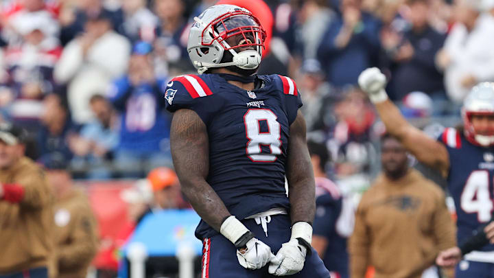 Nov 5, 2023; Foxborough, Massachusetts, USA; New England Patriots linebacker Ja'Whaun Bentley (8) celebrates after sacking Washington Commanders quarterback Sam Howell (14) during the second half at Gillette Stadium. Mandatory Credit: Paul Rutherford-Imagn Images