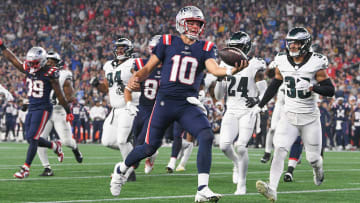 Aug 15, 2024; Foxborough, MA, USA; New England Patriots quarterback Drake Maye (10) runs the ball in for a touchdown against the Philadelphia Eagles during the first half at Gillette Stadium. Mandatory Credit: Eric Canha-USA TODAY Sports