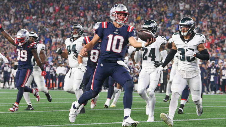 Aug 15, 2024; Foxborough, MA, USA; New England Patriots quarterback Drake Maye (10) runs the ball in for a touchdown against the Philadelphia Eagles during the first half at Gillette Stadium. Mandatory Credit: Eric Canha-USA TODAY Sports