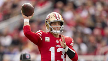 November 17, 2024; Santa Clara, California, USA; San Francisco 49ers quarterback Brock Purdy (13) passes the football against the Seattle Seahawks during the first quarter at Levi's Stadium. Mandatory Credit: Kyle Terada-Imagn Images