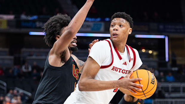 Rutgers Scarlet Knights guard Ace Bailey (4) shoots the ball while USC Trojans guard Kevin Patton Jr. (8)