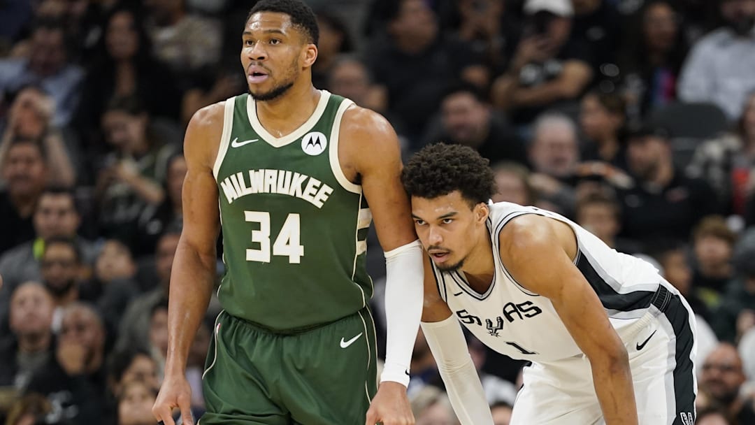 Jan 31, 2025; San Antonio, Texas, USA; Milwaukee Bucks forward Giannis Antetokounmpo (34) and San Antonio Spurs center Victor Wembanyama (1) during the first half at Frost Bank Center. Mandatory Credit: Scott Wachter-Imagn Images