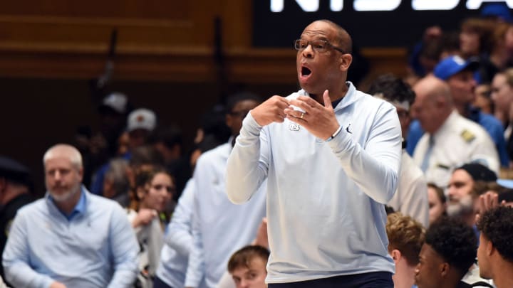 UNC basketball head coach Hubert Davis versus Duke