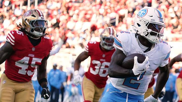 Tennessee Titans running back Tyjae Spears (2) pursued by San Francisco 49ers linebacker Nick Martin (45)