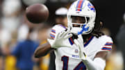 Aug 17, 2024; Pittsburgh, Pennsylvania, USA;  Buffalo Bills  wide receiver Deon Cain (14) warms up before a game against the Pittsburgh Steelers at Acrisure Stadium. Mandatory Credit: Charles LeClaire-Imagn Images