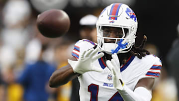 Aug 17, 2024; Pittsburgh, Pennsylvania, USA;  Buffalo Bills  wide receiver Deon Cain (14) warms up before a game against the Pittsburgh Steelers at Acrisure Stadium. Mandatory Credit: Charles LeClaire-Imagn Images