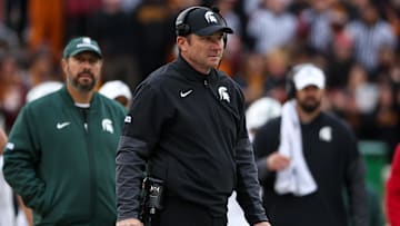 Nov 1, 2025; Minneapolis, Minnesota, USA; Michigan State Spartans head coach Jonathan Smith looks on during the first half against the Minnesota Golden Gophers at Huntington Bank Stadium. Mandatory Credit: Matt Krohn-Imagn Images