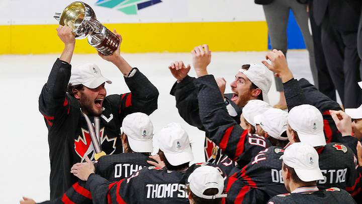 Aug 20, 2022; Edmonton, Alberta, CAN; Team Canada forward Mason MacTavish (23) celebrates with the World Junior Championship trophy after winning the championship game during the IIHF U20 Ice Hockey World Championship at Rogers Place. Mandatory Credit: Perry Nelson-USA TODAY Sports