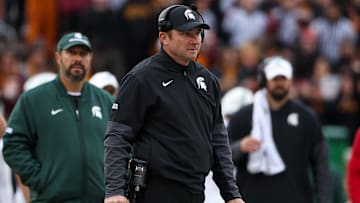 Nov 1, 2025; Minneapolis, Minnesota, USA; Michigan State Spartans head coach Jonathan Smith looks on during the first half against the Minnesota Golden Gophers at Huntington Bank Stadium. Mandatory Credit: Matt Krohn-Imagn Images