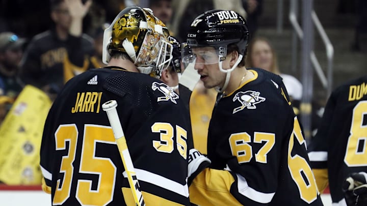 Rickard Rakell and Tristan Jarry along with Vladislav Kolyachonok (not pictured) welcome in their first sons into the world; Mandatory Credit: Charles LeClaire-Imagn Images