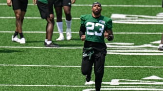 May 23, 2023; Florham Park, NJ, USA; New York Jets safety Chuck Clark (23) warms up during OTA s at Atlantic Health Jets Training Center