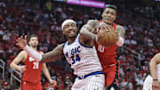 Nov 16, 2025; Houston, Texas, USA; Orlando Magic center Wendell Carter Jr. (34) and Houston Rockets forward Jabari Smith Jr. (10) battle for a ball during the second quarter at Toyota Center. Mandatory Credit: Troy Taormina-Imagn Images