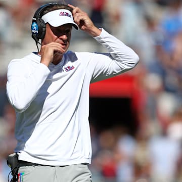 Oct 11, 2025; Oxford, Mississippi, USA; Mississippi Rebels head coach Lane Kiffin looks on during the third quarter against the Washington State Cougars at Vaught-Hemingway Stadium. Mandatory Credit: Petre Thomas-Imagn Images