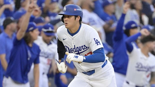 Dodgers DH Shohei Ohtani runs toward home plate