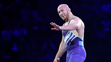 Apr 20, 2024; State College, Pennsylvania, USA; Kyle Snyder waves to his family after defeating Isaac Trumble (not pictured) 4-0 by decision in the 97 kilograms freestyle Championship Final during day two of the U.S. Olympic Wrestling Team Trials at Bryce Jordan Center at Penn State. Mandatory Credit: Matthew O'Haren-Imagn Images