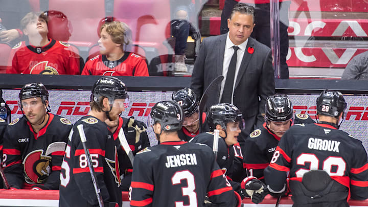 Nov 7, 2024; Ottawa, Ontario, CAN; Ottawa Senators head coach Travis Green looks over at his players during a break in the third period against the New York Islanders at the Canadian Tire Centre. Mandatory Credit: Marc DesRosiers-Imagn Images Nov 7, 2024; Ottawa, Ontario, CAN; Ottawa Senators head coach Travis Green looks over at his players during a break in the third period against the New York Islanders at the Canadian Tire Centre. Mandatory Credit: Marc DesRosiers-Imagn Images