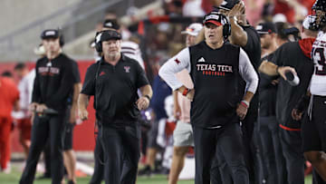 Oct 4, 2025; Houston, Texas, USA; Texas Tech Raiders head coach Joey McGuire walks the sidelines while coaching against the Houston Cougars in the first half at TDECU Stadium. Mandatory Credit: Thomas Shea-Imagn Images
