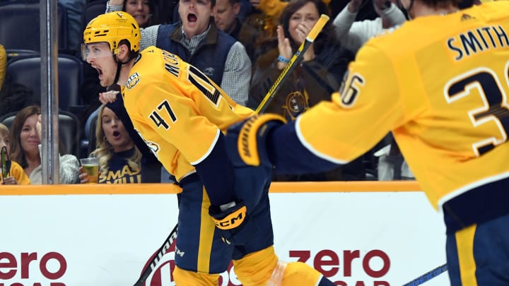 Apr 4, 2024; Nashville, Tennessee, USA; Nashville Predators right wing Michael McCarron (47) celebrates after a goal during the third period against the St. Louis Blues at Bridgestone Arena. Mandatory Credit: Christopher Hanewinckel-USA TODAY Sports