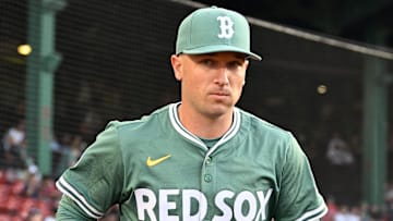 May 16, 2025; Boston, Massachusetts, USA; Boston Red Sox third baseman Alex Bregman (2) runs out of the dugout before the start of a game against the Atlanta Braves at Fenway Park