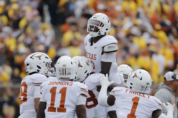 Texas Longhorns defensive back Derek Williams Jr. (2) celebrates with teammates after making an interception, Sept. 7, 2024