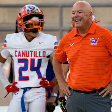 Canutillo head football coach Scott Brooks smiles on the sideline during the Eagles’ season opener against Pebble Hills on Friday, Aug. 29, 2025, at the SAC (Socorro ISD Student Activities Complex) in El Paso, Texas.