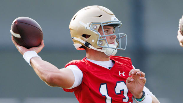 Notre Dame quarterback Riley Leonard throws in practic