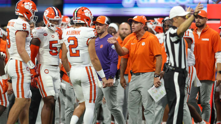 Aug 31, 2024; Atlanta, Georgia, USA; Clemson Tigers quarterback Cade Klubnik (2) talks to head coach Dabo Swinney against the Georgia Bulldogs in the second quarter at Mercedes-Benz Stadium. Mandatory Credit: Brett Davis-USA TODAY Sports