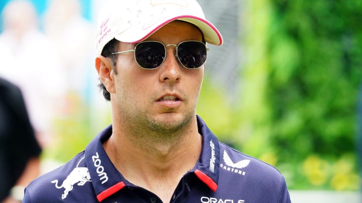 May 5, 2024; Miami Gardens, Florida, USA; Red Bull Racing driver Sergio Perez (11) arrives in the paddock before the Miami Grand Prix at Miami International Autodrome. Mandatory Credit: John David Mercer-USA TODAY Sports