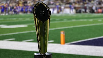 Nov 22, 2025; Atlanta, Georgia, USA; A view of the college football playoff national championship trophy on the sidelines of a game between the Georgia Tech Yellow Jackets and Pittsburgh Panthers in the fourth quarter at Bobby Dodd Stadium at Hyundai Field. Mandatory Credit: Brett Davis-Imagn Images