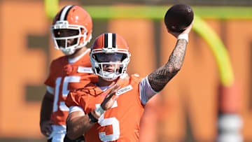 Jul 23, 2025; Berea, OH, USA; Cleveland Browns quarterback Dillon Gabriel (5) throws a pass as quarterback Joe Flacco (15) looks on during training camp at CrossCountry Mortgage Campus. Mandatory Credit: Ken Blaze-Imagn Images