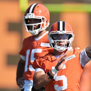 Jul 23, 2025; Berea, OH, USA; Cleveland Browns quarterback Dillon Gabriel (5) throws a pass as quarterback Joe Flacco (15) looks on during training camp at CrossCountry Mortgage Campus. Mandatory Credit: Ken Blaze-Imagn Images