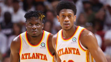 Clint Capela #15 and De'Andre Hunter #12 of the Atlanta Hawks