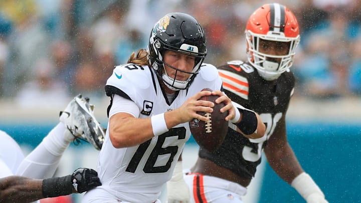 Jacksonville Jaguars quarterback Trevor Lawrence (16) is forced to run as Cleveland Browns defensive tackle Quinton Jefferson (72) pressures during the second quarter of an NFL football matchup Sunday, Sept. 15, 2024 at EverBank Stadium in Jacksonville, Fla. The Browns defeated the Jaguars 18-13. [Corey Perrine/Florida Times-Union]