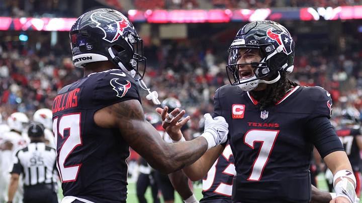 Dec 14, 2025; Houston, Texas, USA; Houston Texans wide receiver Nico Collins (12) and quarterback C.J. Stroud (7) celebrate a touchdown during the fourth quarter against the Arizona Cardinals at NRG Stadium. Mandatory Credit: Troy Taormina-Imagn Images