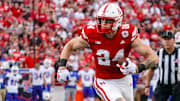 Sep 23, 2023; Lincoln, Nebraska, USA; Nebraska Cornhuskers tight end Thomas Fidone II (24) runs for a touchdown against the Louisiana Tech Bulldogs during the fourth quarter at Memorial Stadium. 