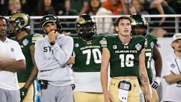 Dec 28, 2024; Tucson, AZ, USA; Colorado State Rams head coach Jay Norvell and quarterback Brayden Fowler-Nicolosi (16) against the Miami (OH) RedHawks during the Snoop Dogg Arizona Bowl at Arizona Stadium. Mandatory Credit: Mark J. Rebilas-Imagn Images
