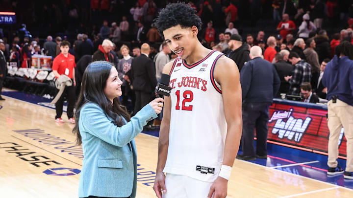 Jan 14, 2025; New York, New York, USA;  Peacock reporter Caroline Pineda and St. John's basketball guard RJ Luis Jr. (12) at Madison Square Garden.