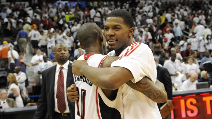 May 2, 2010; Atlanta, GA, USA; Atlanta Hawks guard Jamal Crawford (11) and guard Joe Johnson (2) embrace after defeating the Milwaukee Bucks in game seven in the first round of the 2010 NBA playoffs at Philips Arena. The Hawks defeated the Bucks 95-74. Mandatory Credit: Dale Zanine-USA TODAY Sports