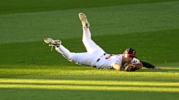 Oct 7, 2024; Cleveland, Ohio, USA; Cleveland Guardians outfielder Steven Kwan (38) dives to make a catch during the eighth inning against the Detroit Tigers during game two of the ALDS for the 2024 MLB Playoffs at Progressive Field. Mandatory Credit: David Richard-Imagn Images