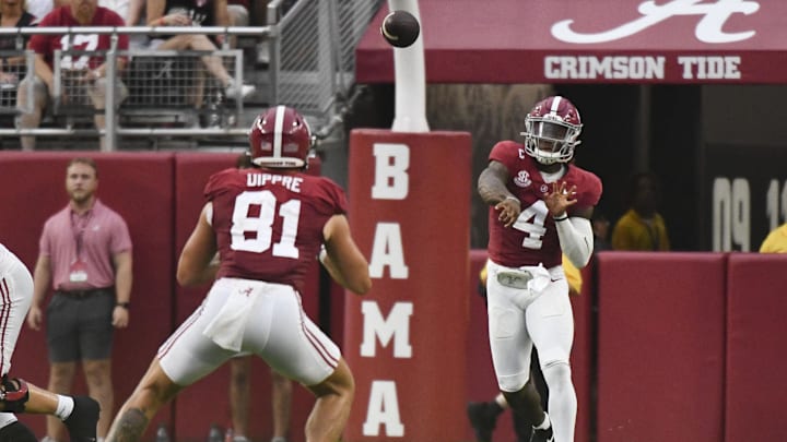 Aug 31, 2024; Tuscaloosa, Alabama, USA;  Alabama Crimson Tide quarterback Jalen Milroe (4) throws to tight end CJ Dippre (81) against the Western Kentucky Hilltoppers during the first half at Bryant-Denny Stadium.  Mandatory Credit: Gary Cosby Jr.-Imagn Images